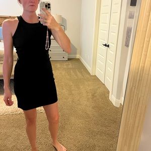 Black size M fitted mini dress